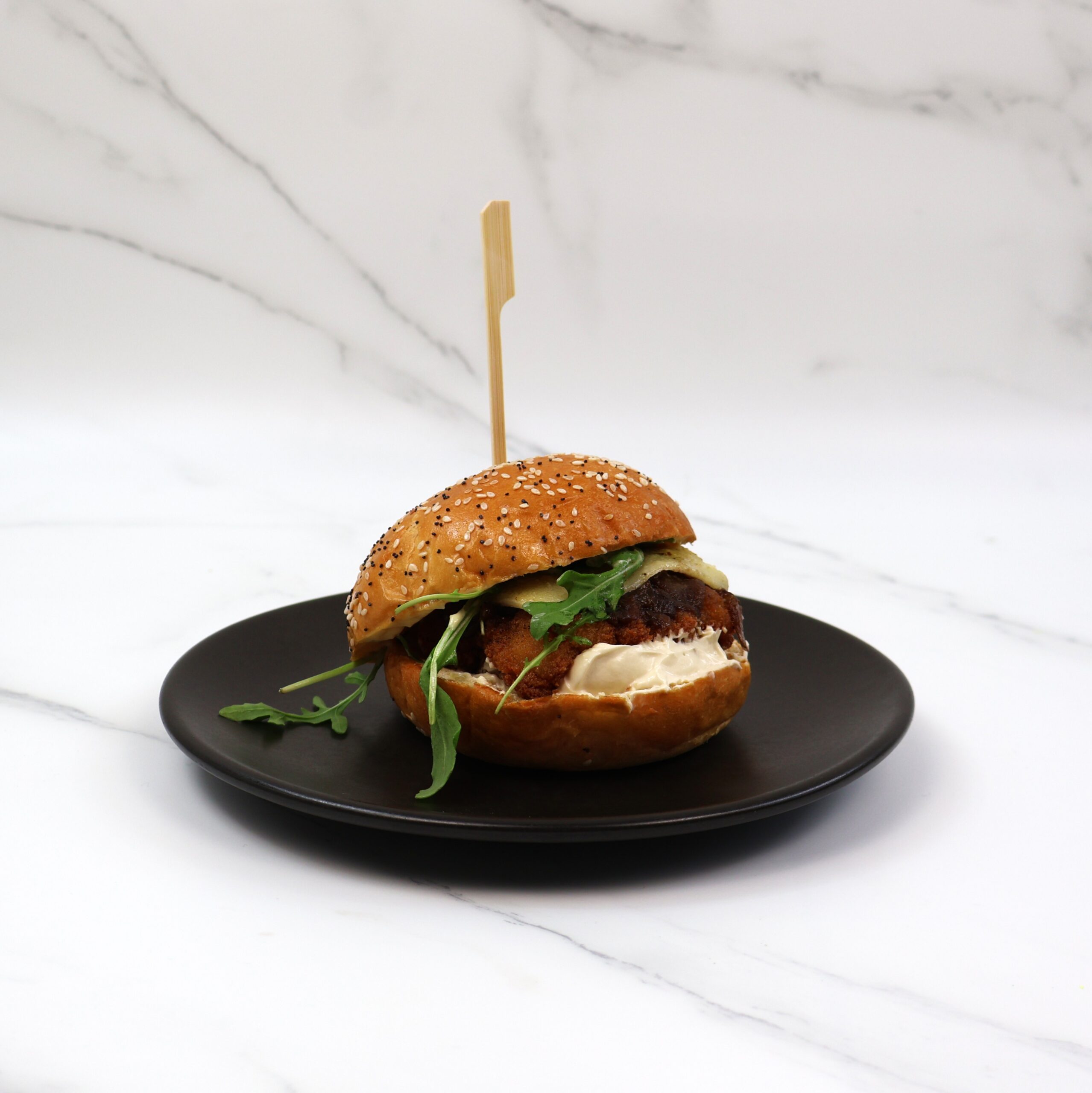 Hot French onion chicken burger, gruyère, dijonaise, rocket